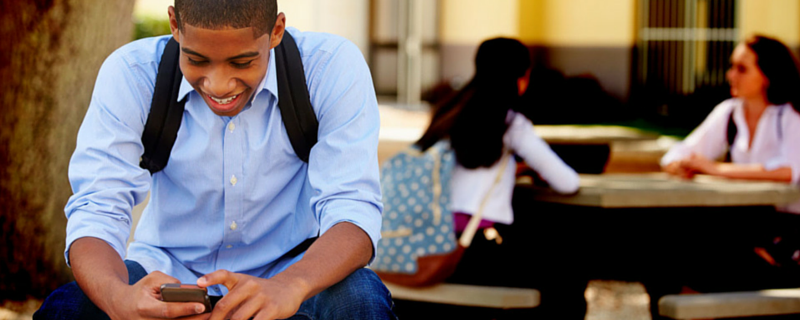 student looking at social media